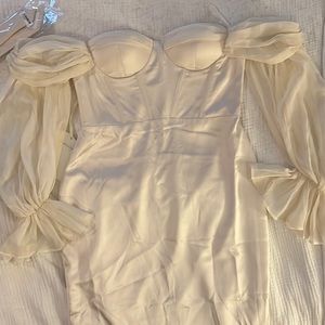 NWT Cream body con dress with billowy sleeves and corset top